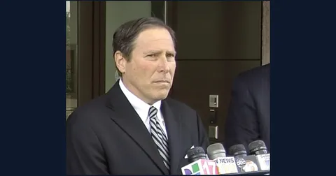 Phillip L.B. Halpern speaking to reporters outside a federal courthouse
